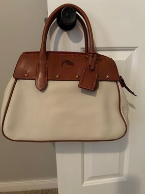 Dooney & Bourke Cream Leather Satchel with Brown Trim and Handles